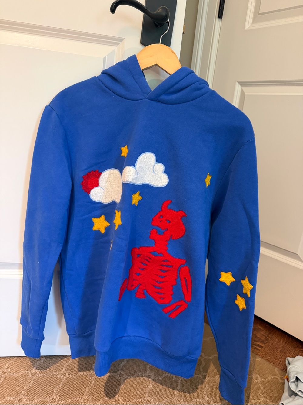 Abstract by Jules Royal Blue Graphic Hoodie with Red Skeleton & Stars